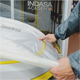 Indasa Cover Roll HDPE Masking Film, technician centering film on hood of car